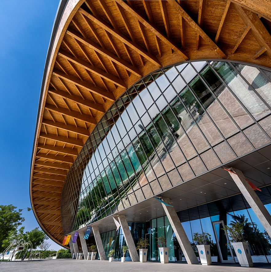 MBZUAI campus exterior with lattice canopy