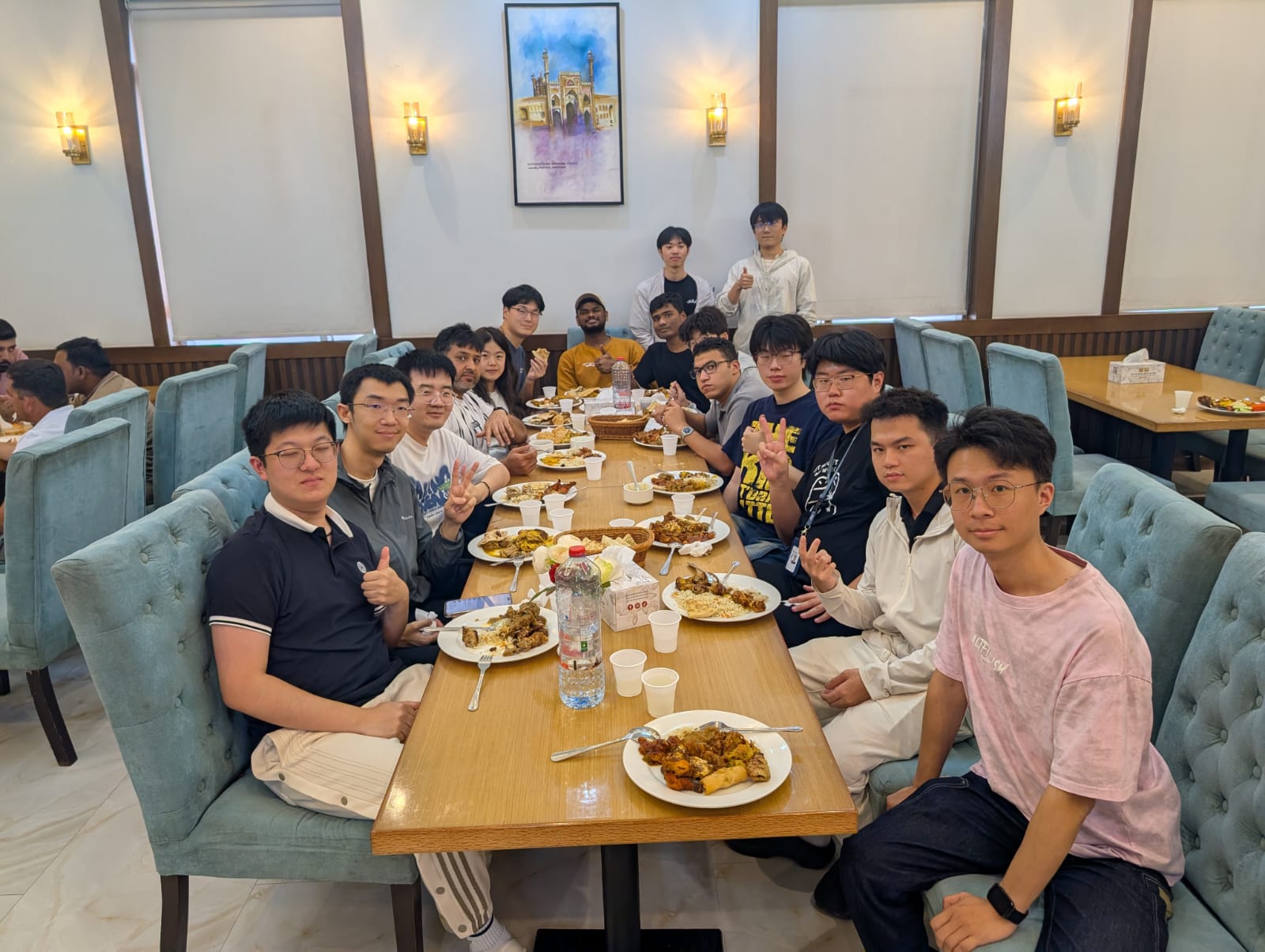 GenMI Lab members at a group dinner during a lab outing